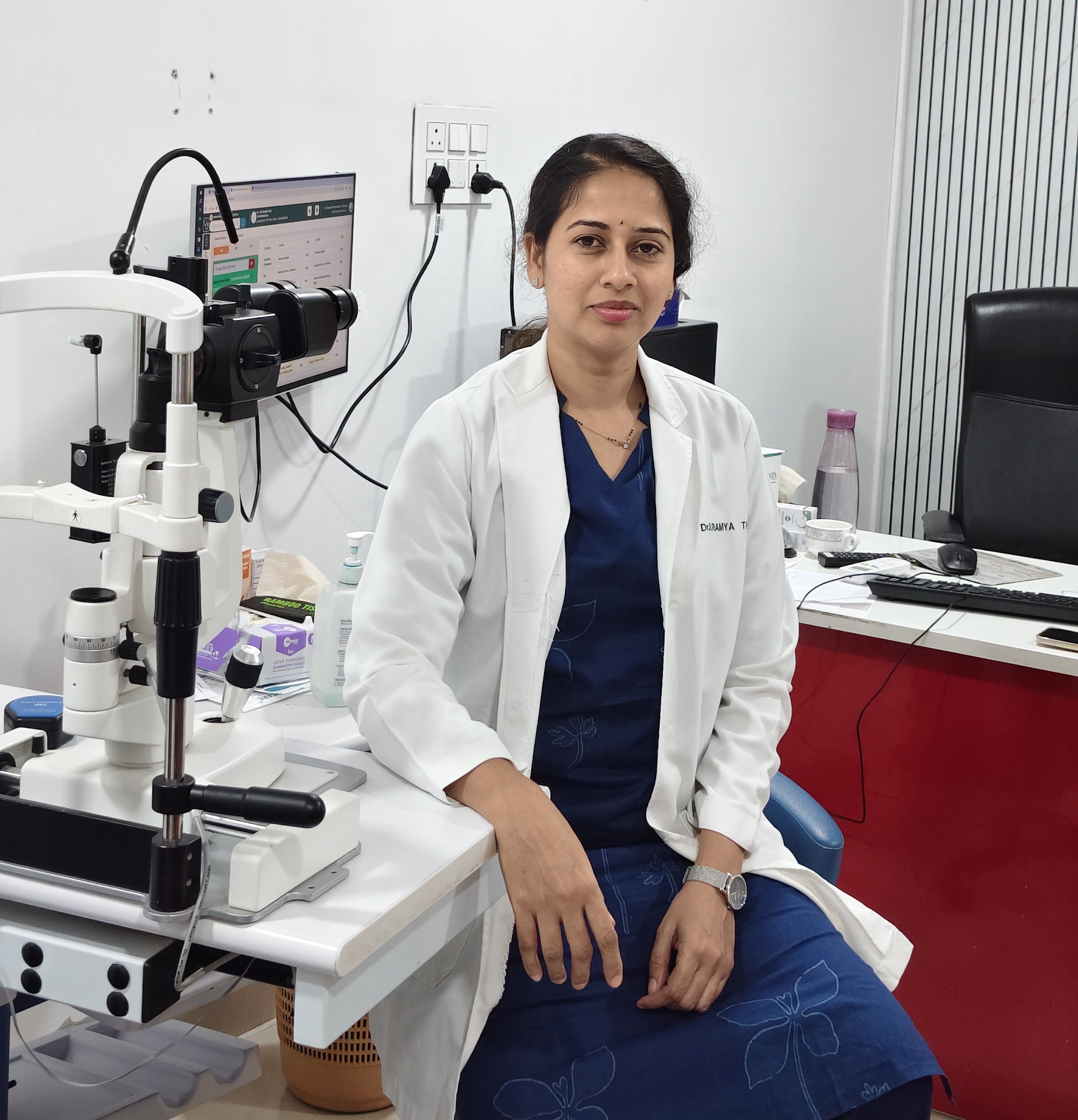 Eye specialist consulting a patient at Elite Eye Hospitals Madinaguda